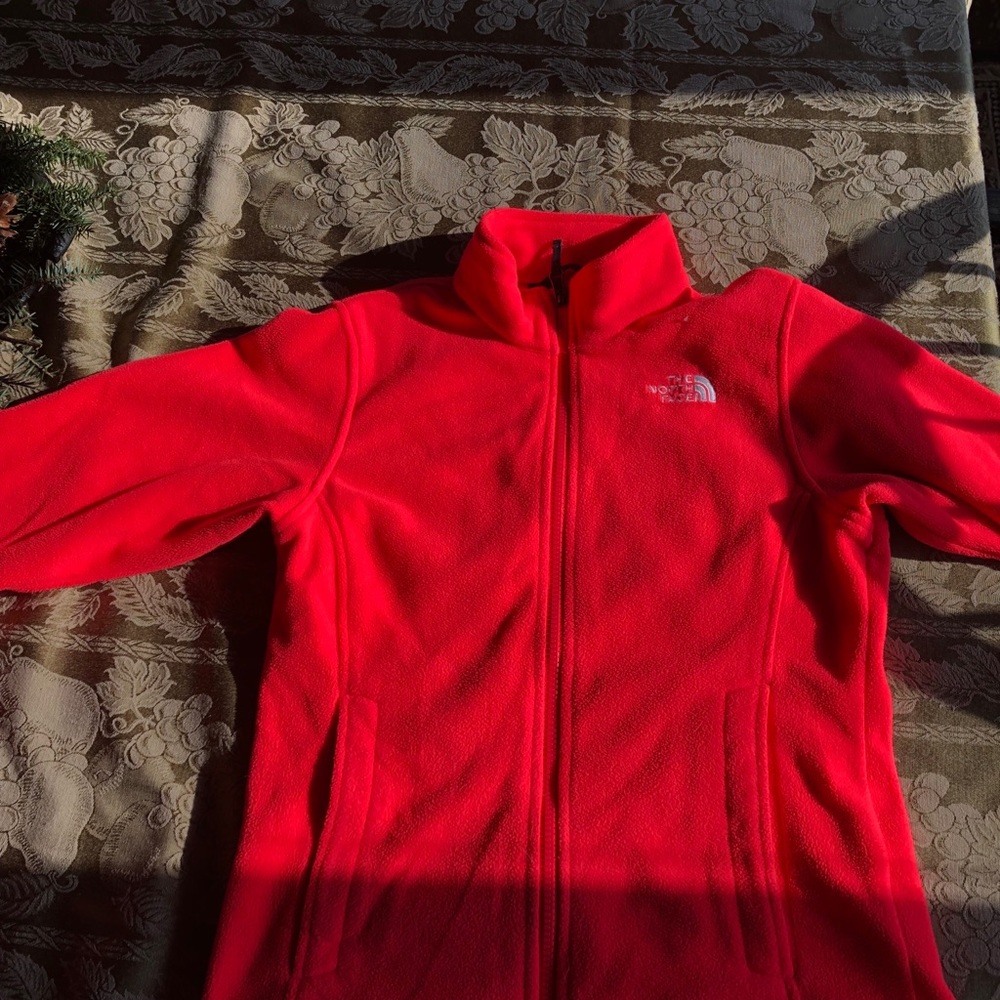 neon orange north face fleece